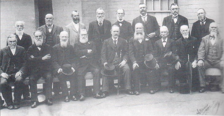 The is no known photo of Crane but he is probably present in the front row of this photo. Fifth from the left is Sir Arthur Renwick